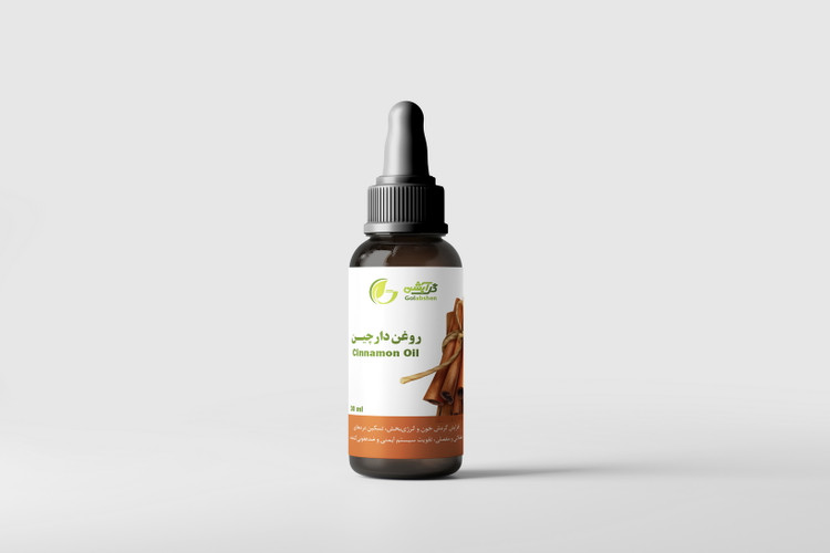 روغن گیاهی دارچین در ظرف قطره چکان شیشه ای قهوه ای