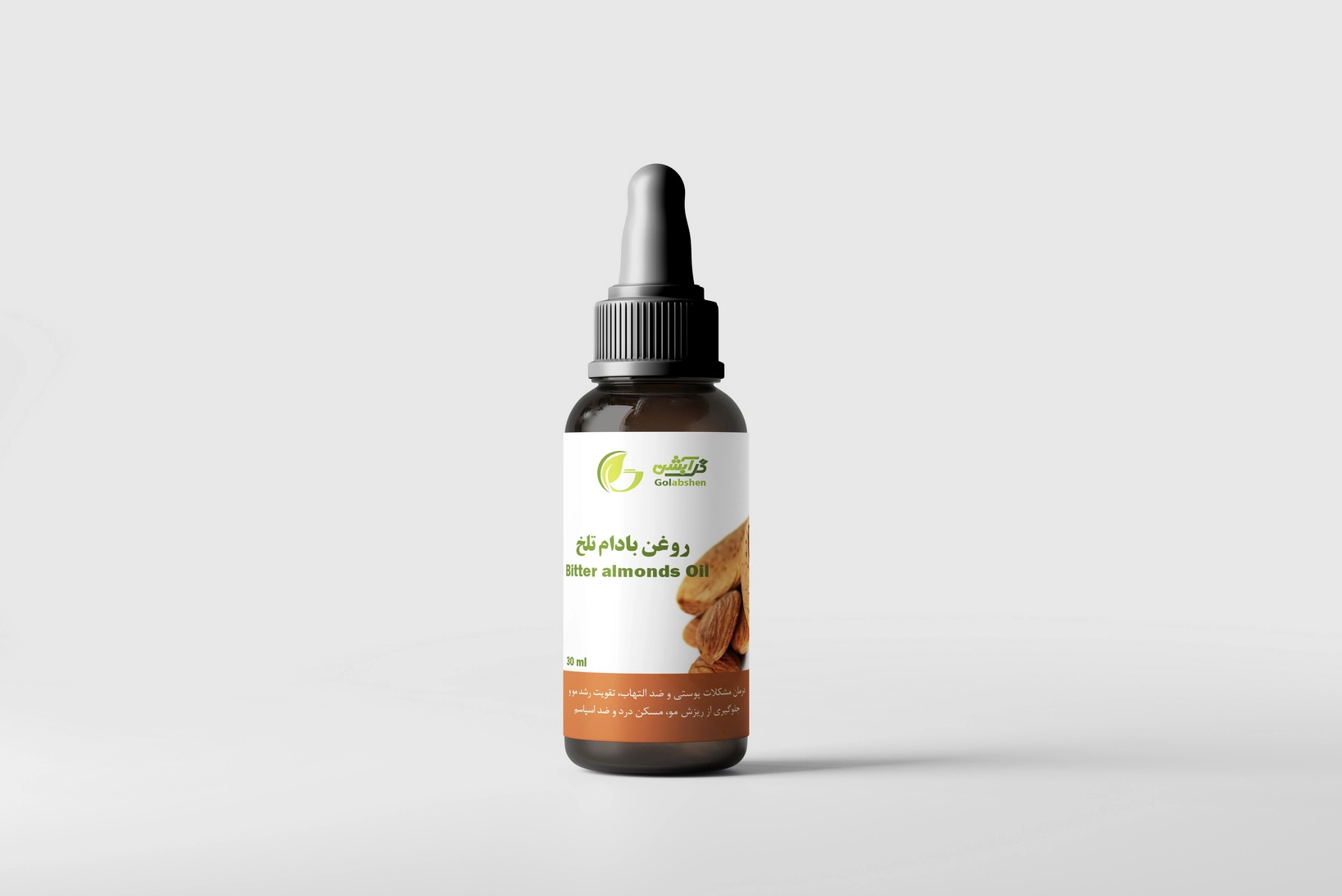 روغن گیاهی بادام تلخ در ظرف قطره چکان شیشه ای قهوه ای
