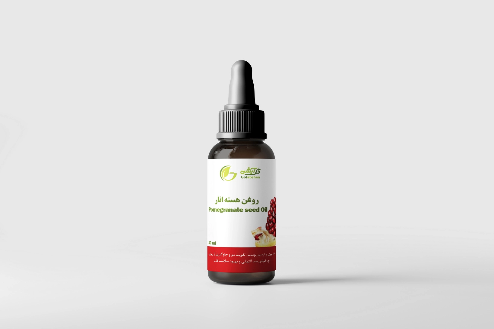 روغن گیاهی روغن هسته انار در ظرف قطره چکان شیشه ای قهوه ای
