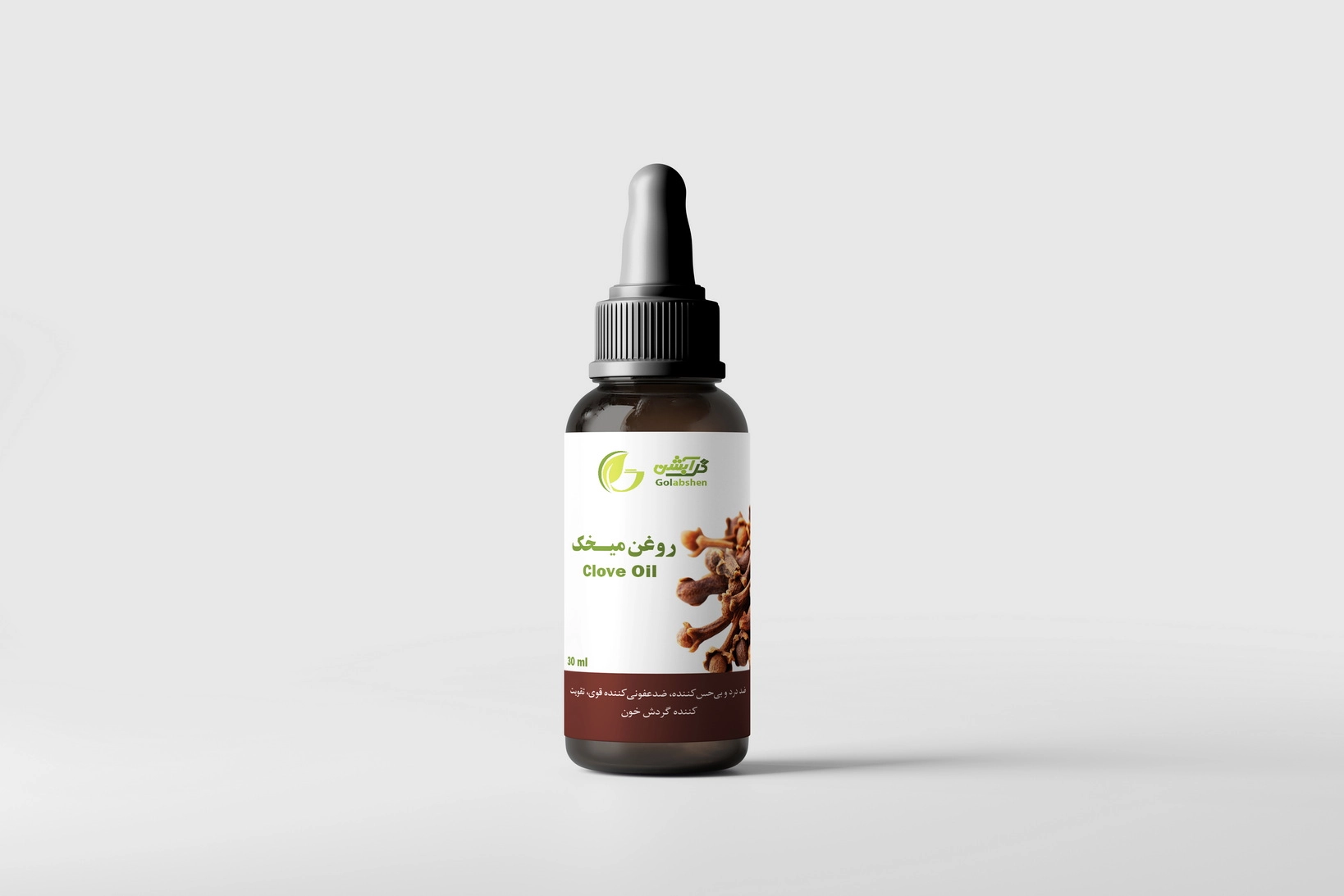 روغن گیاهی میخک در ظرف قطره چکان شیشه ای قهوه ای
