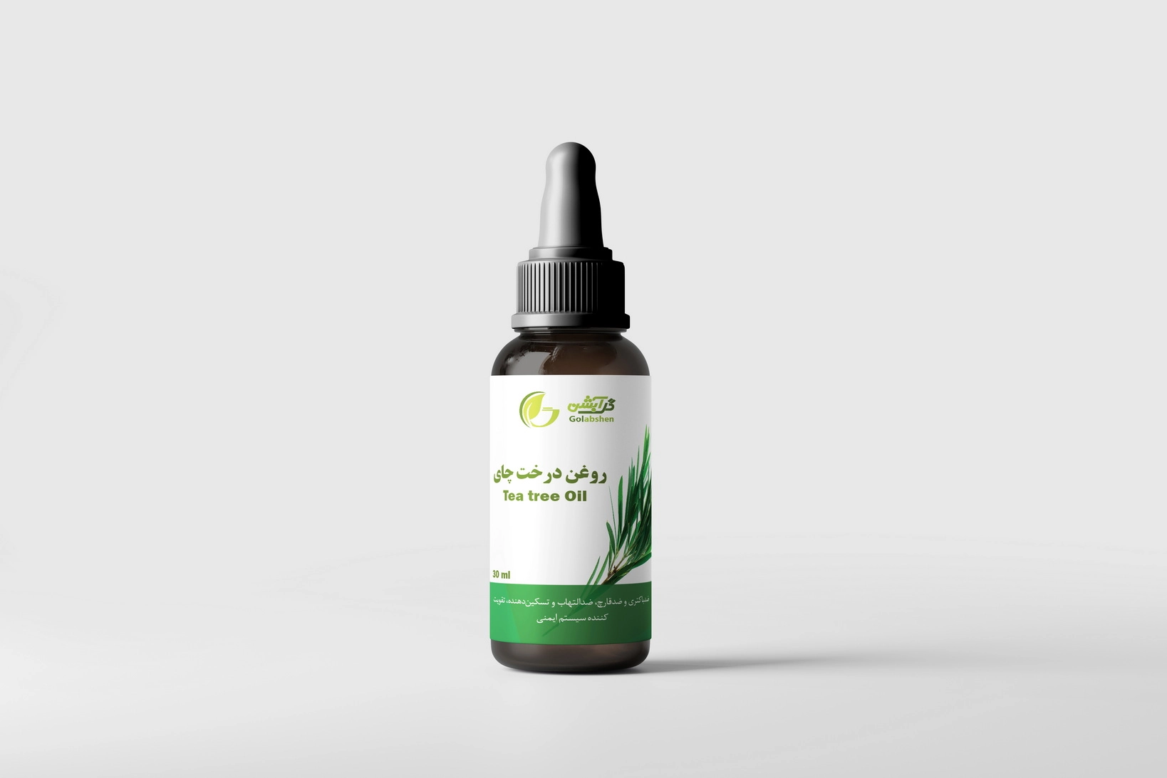 روغن گیاهی درخت چای در ظرف قطره چکان شیشه ای قهوه ای