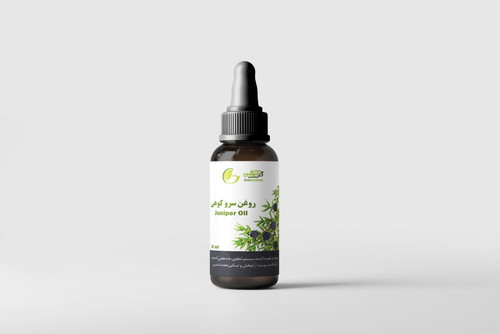 روغن گیاهی سرو کوهی در ظرف قطره چکان شیشه ای قهوه ای