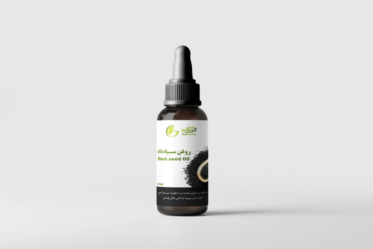 روغن گیاهی سیاه دانه در ظرف قطره چکان شیشه ای قهوه ای