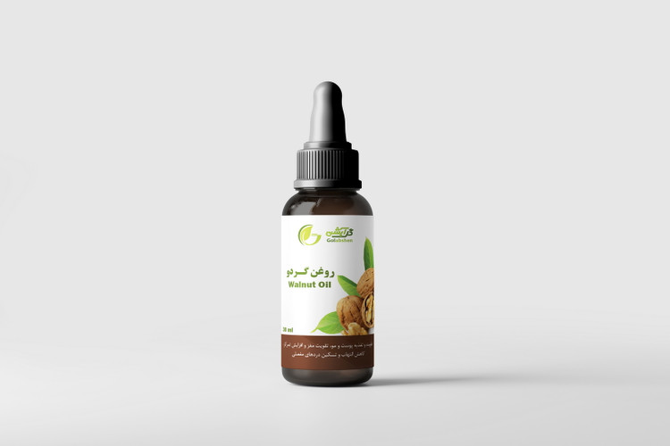 روغن گردو در ظرف قطره چکان شیشه ای قهوه ای