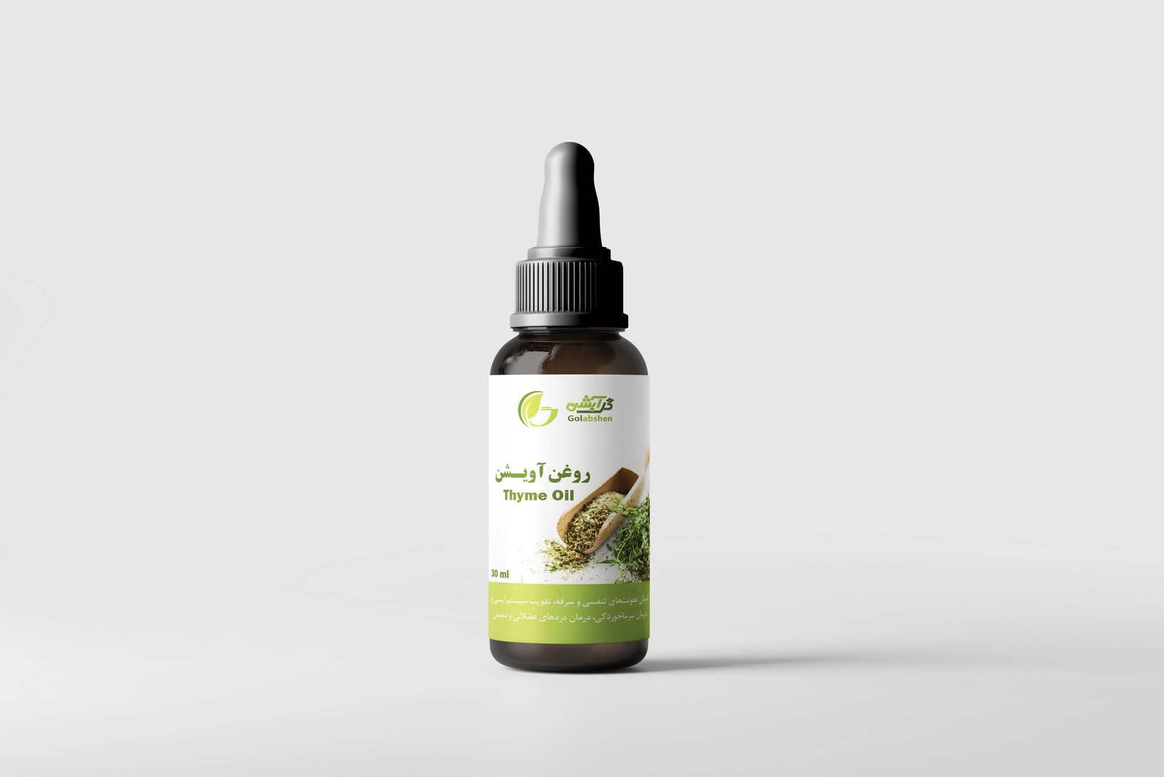 روغن آویشن در ظرف قطره چکان شیشه ای قهوه ای