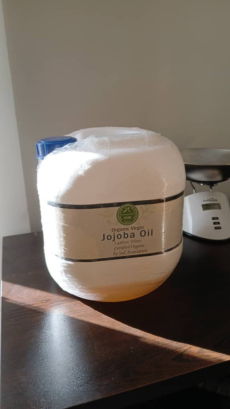 روغن گیاهی جوجوبا در ظرف قطره چکان شیشه ای قهوه ای روغن جوجوبا NHR انگلیس اصل